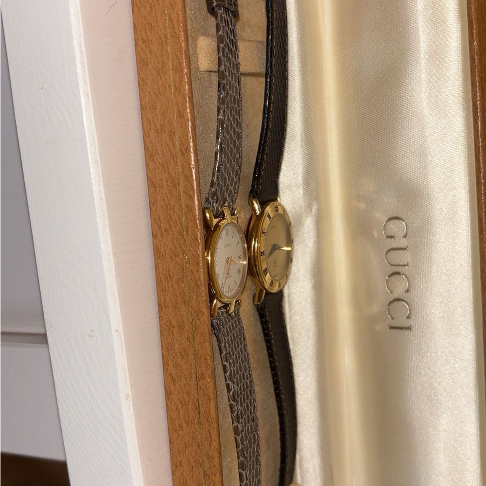 Gucci Women's Gold and Black Watch Duo